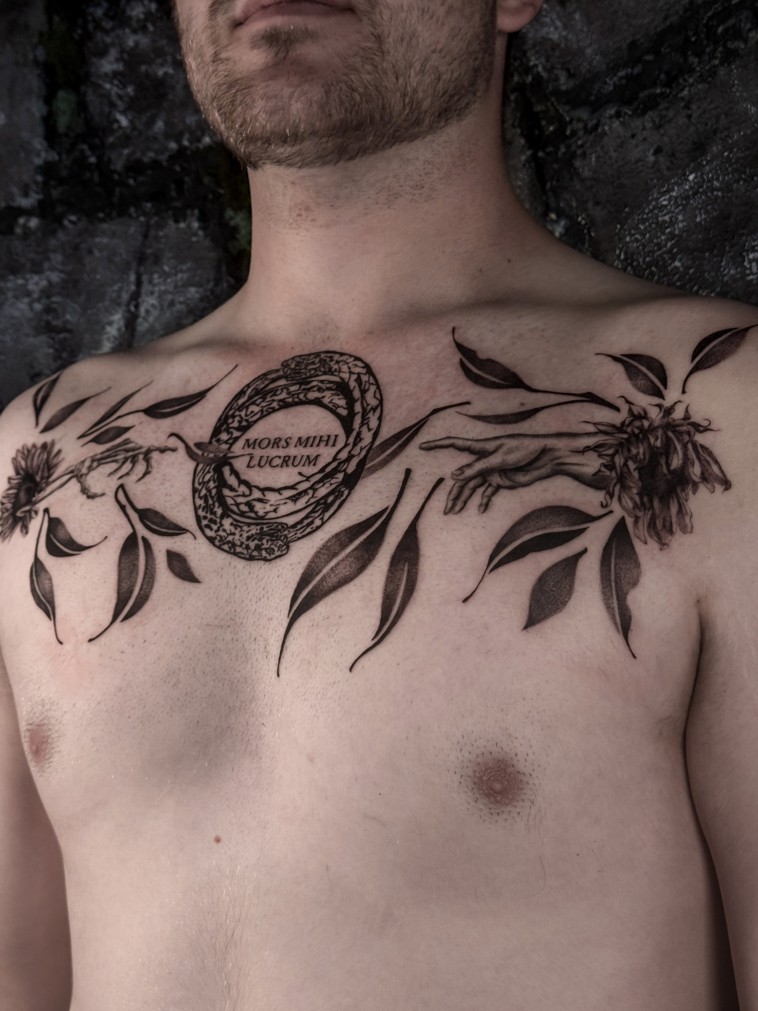 Fine line floral tattoo by Addison Powell at Diroka Tattoo Studio