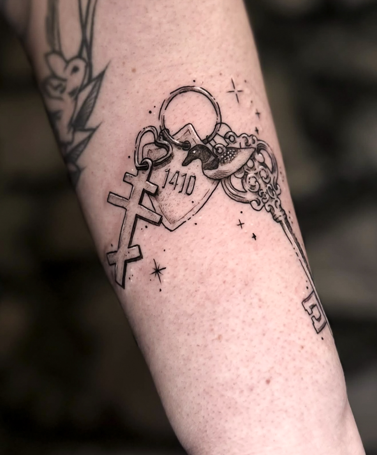 Fine line floral tattoo by Addison Powell at Diroka Tattoo Studio