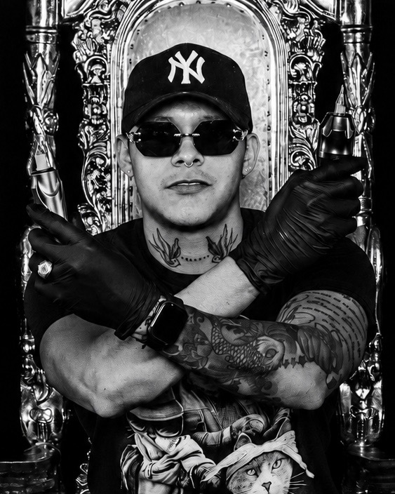Arnold Camargo, tattoo artist in Denver/Aurora, Colorado specializing in Portrait and realism 