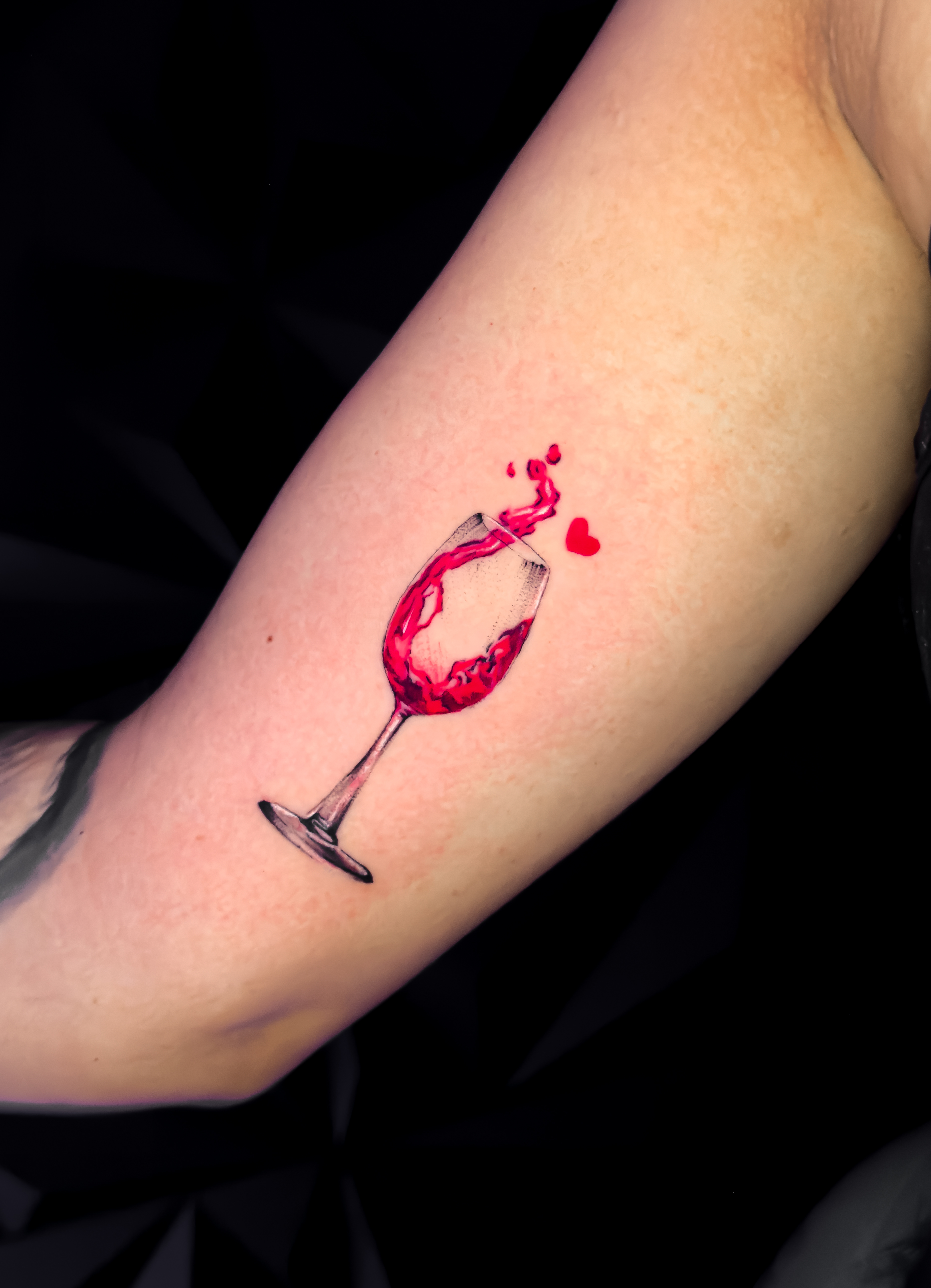 Micro realism wine glass tattoo by Julian at Diroka Tattoo Studio